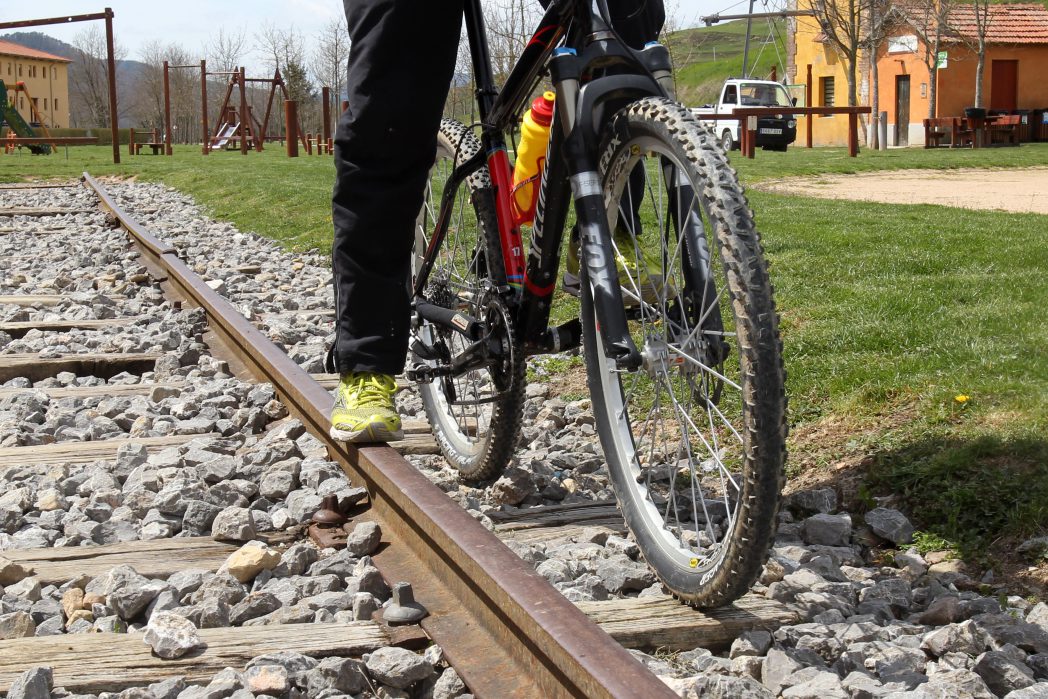 Bike wheels on railway tracks in Sant Joan Abadesses