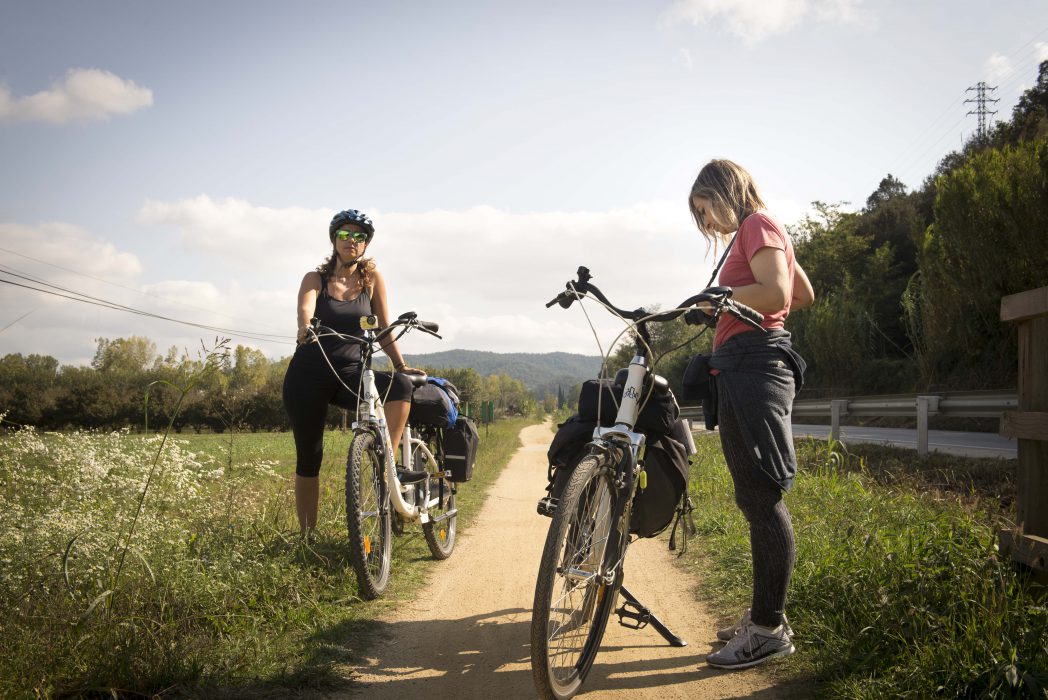 Cyclists in the Carrilet I Route